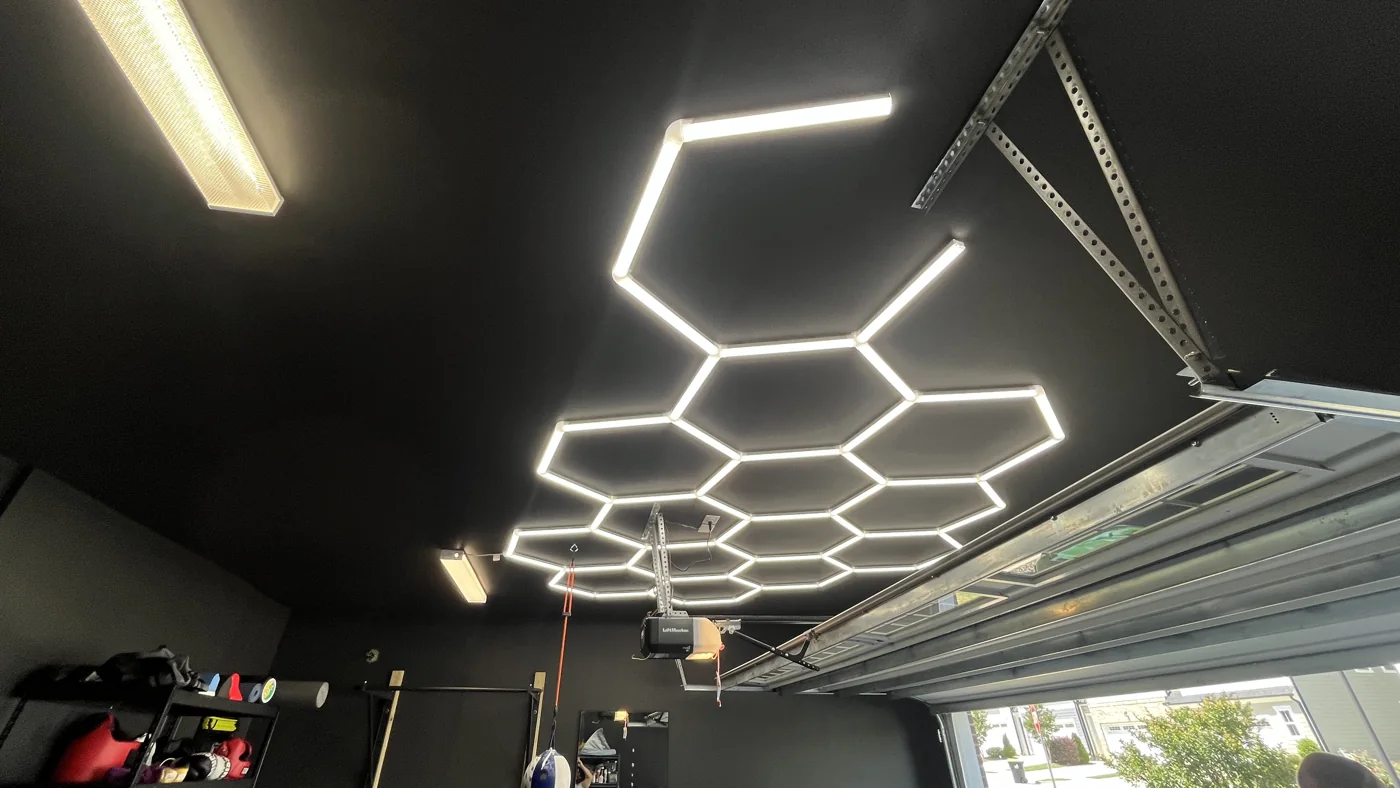 Hexagonal LED ceiling lights installed in a garage